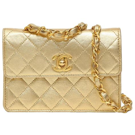 chanel gold vintage laundry bar purse